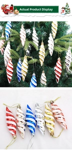 Glittery spiral icicle ornaments in multiple colors hanging on a green Christmas tree