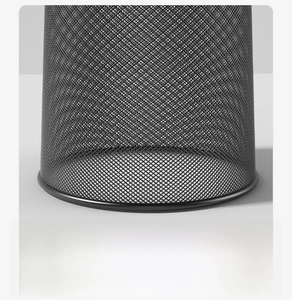 Close-up of black mesh trash can with seamless reinforced bottom and anti-scratch design