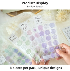 Macro detail of transparent wax seal stickers featuring floral and snowflake embossed patterns