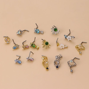 L-shaped surgical steel nose studs with assorted flower and moon charms and colorful zircon