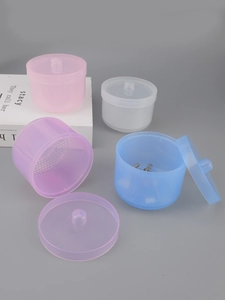 Multi-color nail tool sterilizer boxes with removable drain tray and handle detail