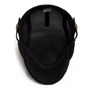 Internal view of a breathable black mesh beret showing quality lining and care label