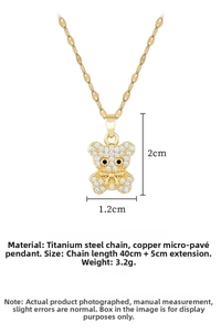 Detailed size view of a gold bear necklace pendant with cubic zirconia and chain measurements