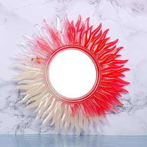 Macro shot of sunburst wall mirror mold with red-white gradient resin and glitter details