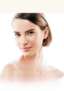 Classic 925 sterling silver bezel-set round brilliant cut stud earrings on a model
