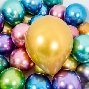 Mix of metallic gold, blue, green, and purple chrome latex balloons for party decoration