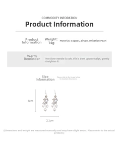 Detail view of 8cm planet pearl tassel earrings with zircon accents and silver pins