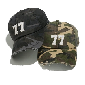 Vintage camouflage baseball caps with 77 embroidery and distressed torn brim detail
