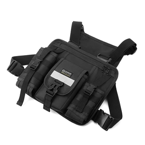Detail of black tactical chest bag showing reflective stripes and FS FASHION SPORT badge