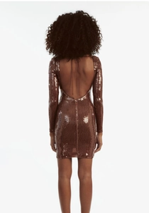 Detailed back view of a brown sequin mini dress featuring a deep U-shaped backless design