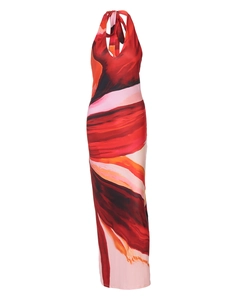 Detail of the elegant red artistic print on this backless halter maxi dress with side slit