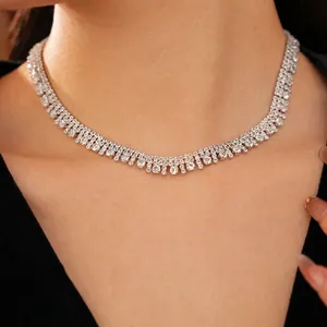 Elegant multi-layer silver choker necklace with shimmering zircons and fringe tassel details