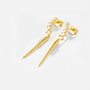 Detail of 925 hallmark on gold plated sterling silver earrings with zircon stones