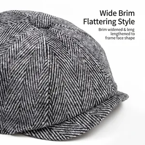 Classic grey herringbone newsboy cap for men and women with a retro baker boy style design