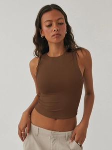 Detailed view of the dark brown ribbed knit fabric on a sleeveless Y2K crop top