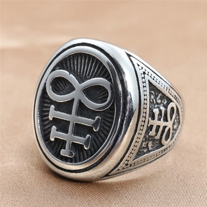 Macro shot of silver titanium steel skull ring featuring embossed Leviathan cross detail