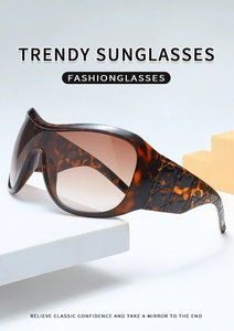 Detailed view of leopard print oversized sunglasses with textured lattice pattern on temples