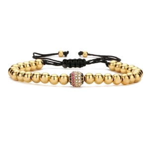 Handmade woven bracelet with gold beads and a micro-pave colorful zircon center ball