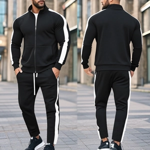 Front and back street view of men's black tracksuit with white side stripes and stand collar