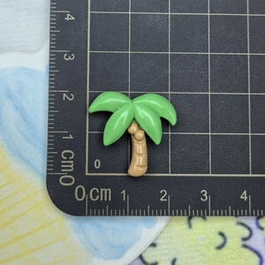 Mini resin coconut tree charm for beach accessories measured with ruler in cm