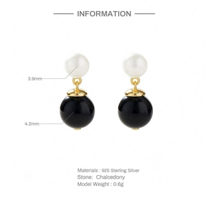 Detail view of 925 silver earrings with black chalcedony and white pearls showing dimensions
