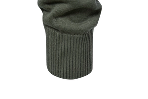 Detail view of military green ribbed cuffs on a men's cotton knit pullover sweater