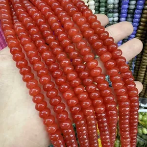 Close-up of polished red agate abacus beads for DIY jewelry and bracelet making