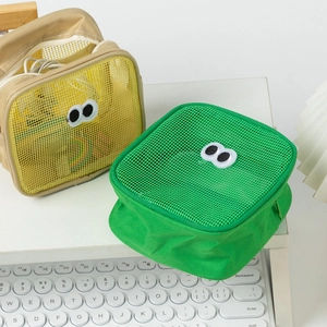 Mesh makeup organizer bags with cartoon eyes in green and yellow colors