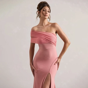 Detail of elegant pink off-shoulder dress with mesh splicing and high side slit