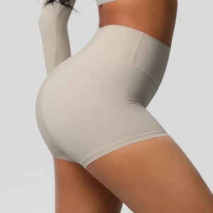 Detail of high-waisted yoga shorts with butt-lifting cut and tummy control compression