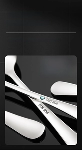 Detail of 304 stainless steel spoon with clear SUS 304 stamp and mirror polished finish
