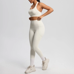 Detail view of double-sided brushed yoga set showing side pocket and high waist leggings