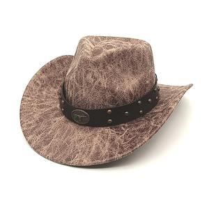 Chapeau de cowboy en daim marron vintage avec bord large, ceinture cuir et boucle tête de taureau