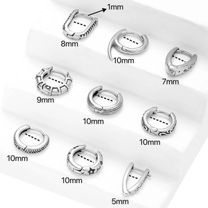 Retro stainless steel hoop earrings with star patterns and various inner diameters