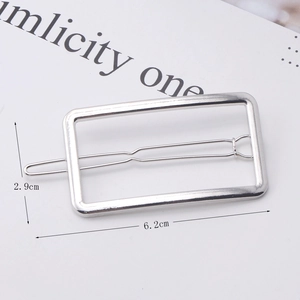 Polished silver alloy bow hairpin measuring 6.2cm x 2.9cm with a sleek rectangular frame