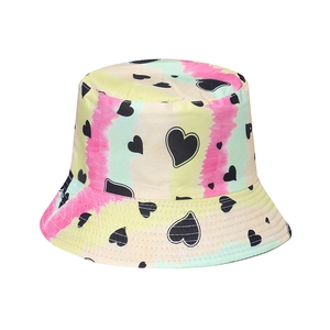 Tie-dye sun hat for women with heart prints in pink, yellow, and green stripes