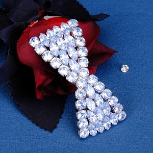 Macro shot of silver plated hair clip with dense sparkling cubic zirconia stones