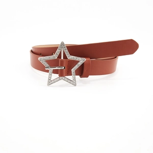 Detailed view of a brown leather belt with a silver star-shaped rhinestone buckle decoration