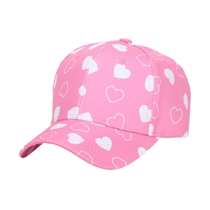 Pink kids' baseball cap with white heart prints and breathable cotton twill fabric