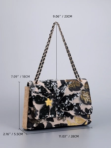 Detailed view of sequin flower embroidery on woven shoulder bag with size measurements