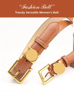 Detail of a brown leather belt with a matte gold buckle for women in a vintage style