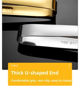 Macro detail of SUS 304 stainless steel food tongs with mirror finish and engraved logo