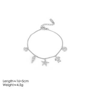 Silver stainless steel ocean charm bracelet featuring starfish turtle and shell pendants