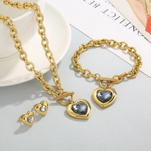 Golden heart jewelry set with grey faceted crystals and OT buckle chain design