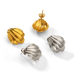 Minimalist shell stud earrings in gold and silver finish with textured steel surface