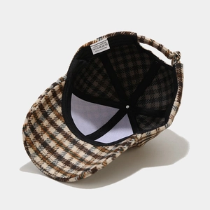 Classic houndstooth plaid baseball cap with adjustable metal buckle for outdoor leisure