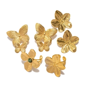 Minimalist gold butterfly and flower stainless steel ring set with green stone