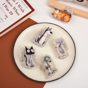 Detail view of colorful acrylic cartoon animal hair claws on a decorative white plate