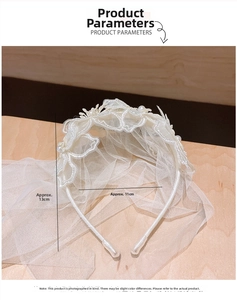 Detail view of white lace flower headband with pearl veil and specific size measurements