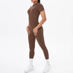 Detail showing the brown zip-front short sleeve athletic bodysuit for gym and running